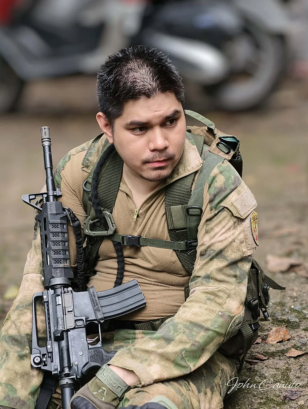 The author in the field with his WE M4 RIS GBBR during an airsoft game